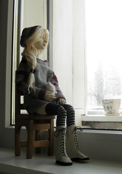 Ball joint doll sitting on a chair