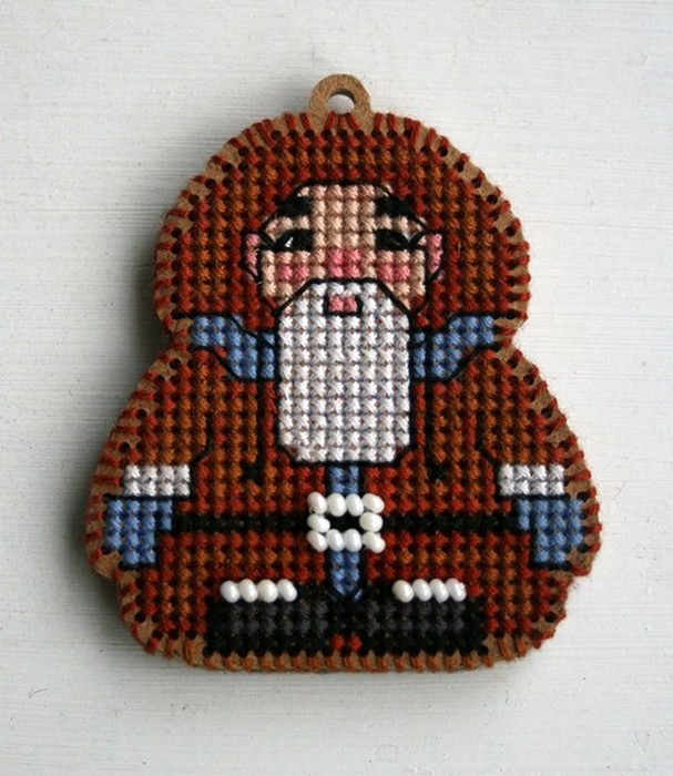 Old man. Embroidered charm.